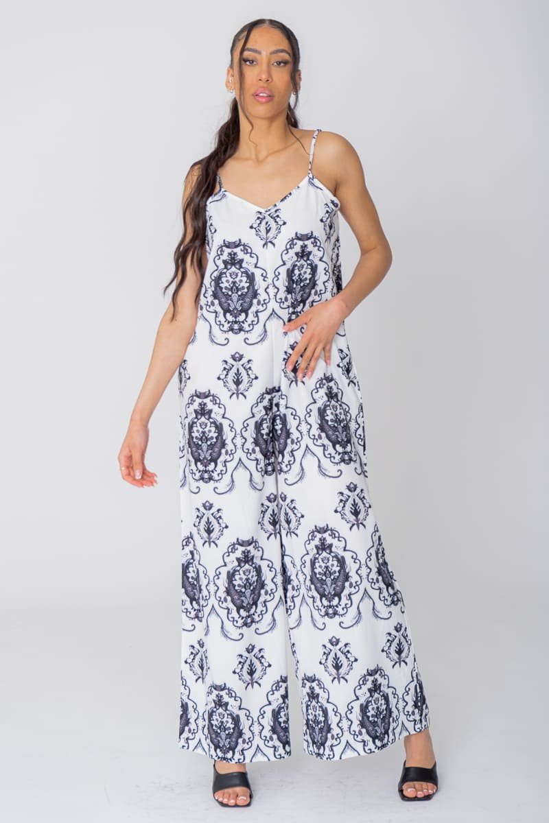 Black flared jumpsuit with baroque pattern Cinelle Paris fashion woman