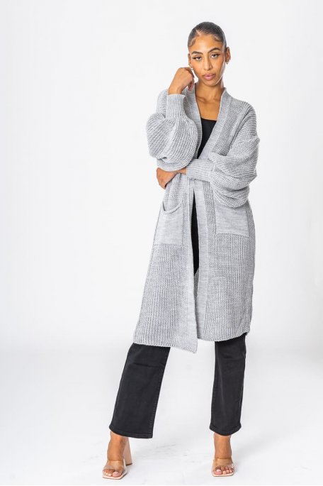 Long knitted cardigan with front pockets in grey