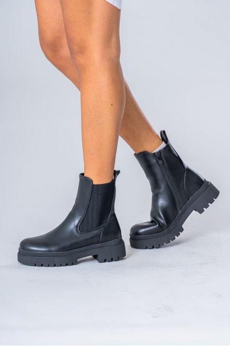 Black platform ankle boots with visible stitching