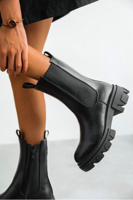 Black oiled imitation leather ankle boots