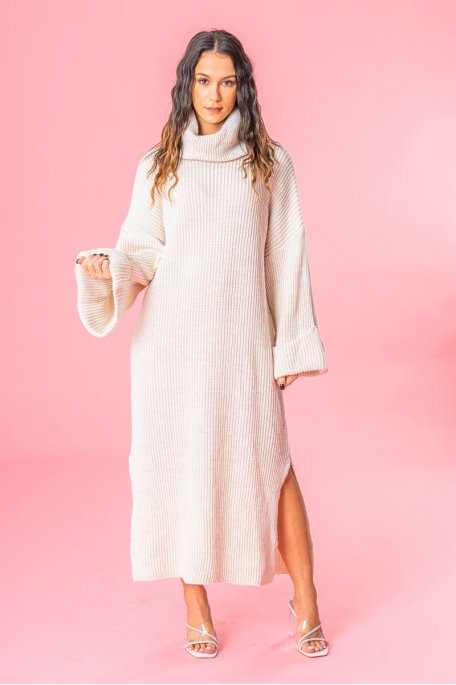 Beige knitted sweater dress with rolled up sleeves and turtleneck