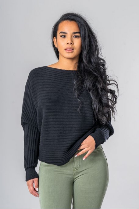 Loose-fitting black boat-neck sweater