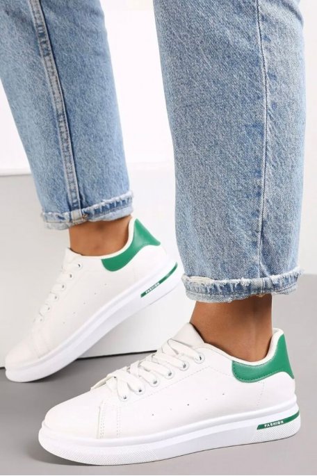 White low top sneakers with green detail