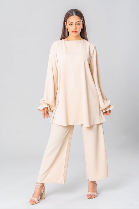 Large blouse and beige pants set