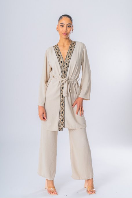 Beige vest and pants set with rhinestone details