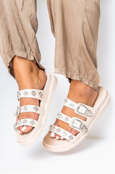 Beige studded flip-flops with thick soles