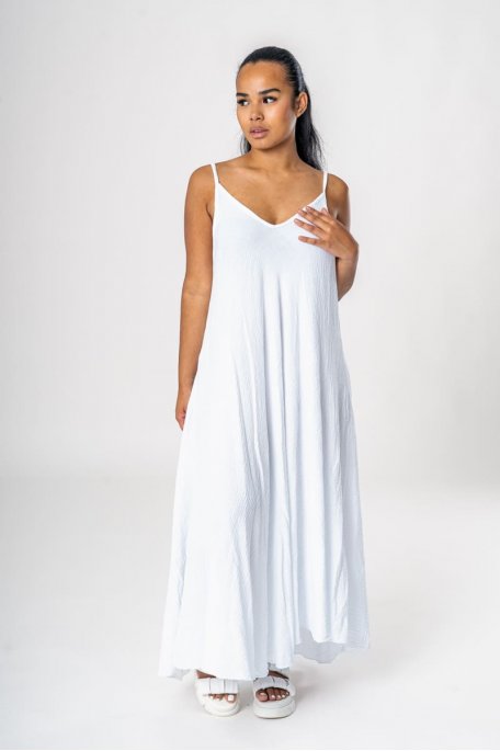 White flowing maxi dress with thin straps