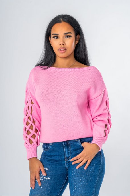Openwork pink knitted sweater with sleeves
