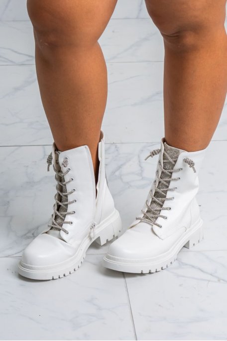 Faux leather boots with white rhinestone tongue