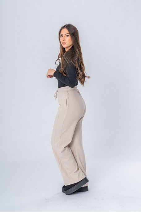 Pantalon de jogging droit nervuré beige - vue de profil look entier