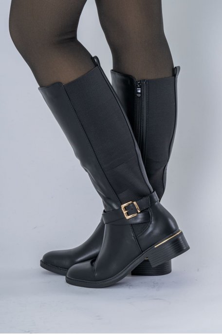 High boots with gold detail and black elastic yoke
