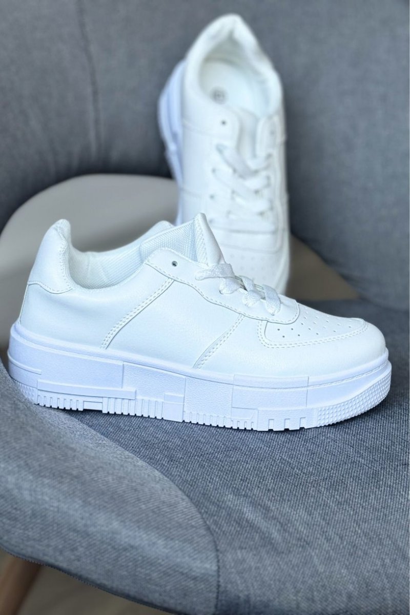 Sneakers blanches a semelle epaisse Cinelle Paris mode femme tendance