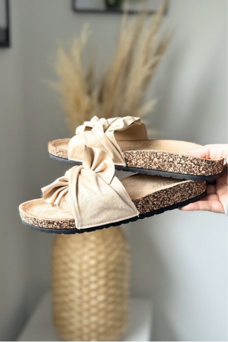 Flat sandals with beige bow