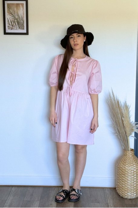 Plain pink dress with bows and short sleeves