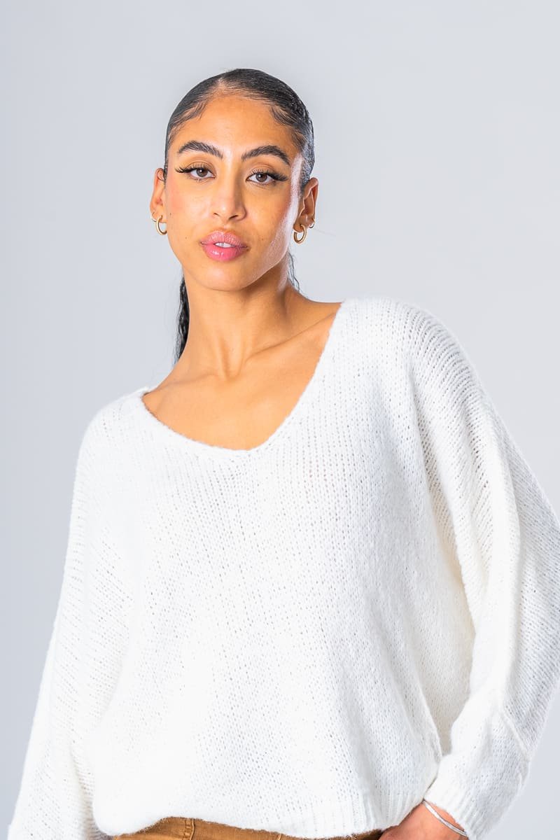 Tight knit V neck sweater with white batwing sleeves Cinelle Paris fashion women