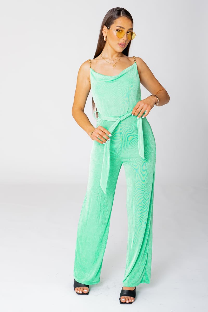 Green jumpsuit with chain straps Cinelle Paris fashion for women